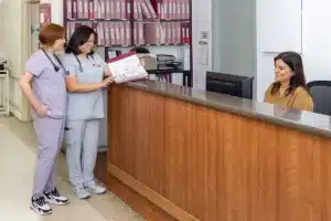 A nurse at the nurses station at San Jacinto Valley