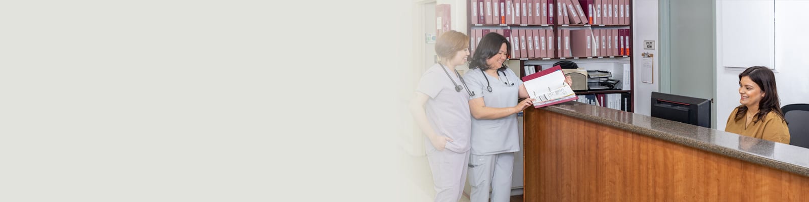 Two nurses standing at the nurses station at San Jacinto
